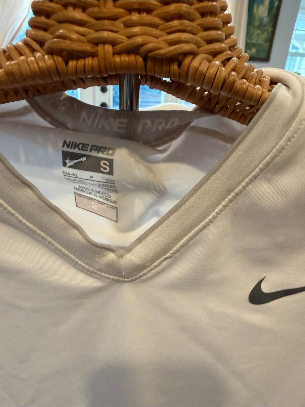 Nike Women’s White V-Neck Short Sleeve Top with Black Swoosh